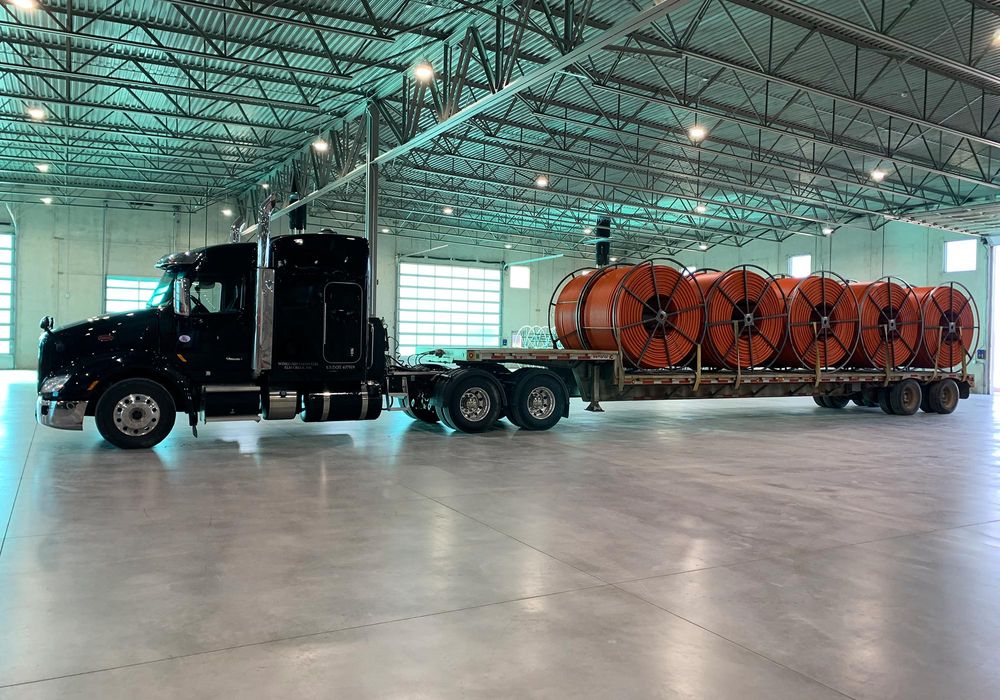 KraussMaffei Pipe extrusion Images machine plastics truck carrying pipes