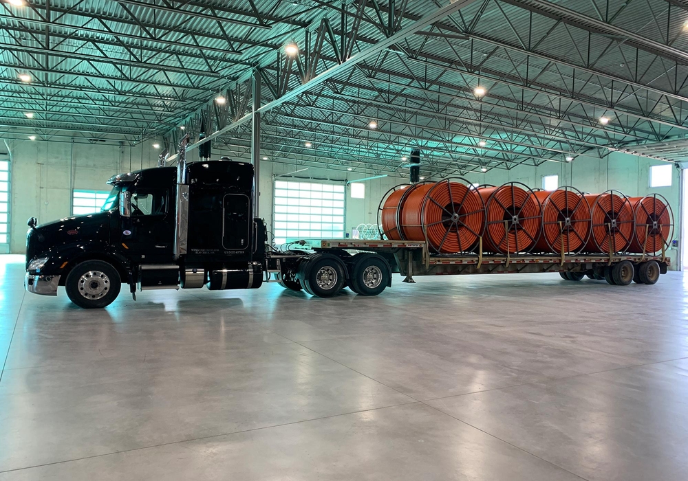 KraussMaffei Pipe extrusion Images machine plastics truck carrying pipes