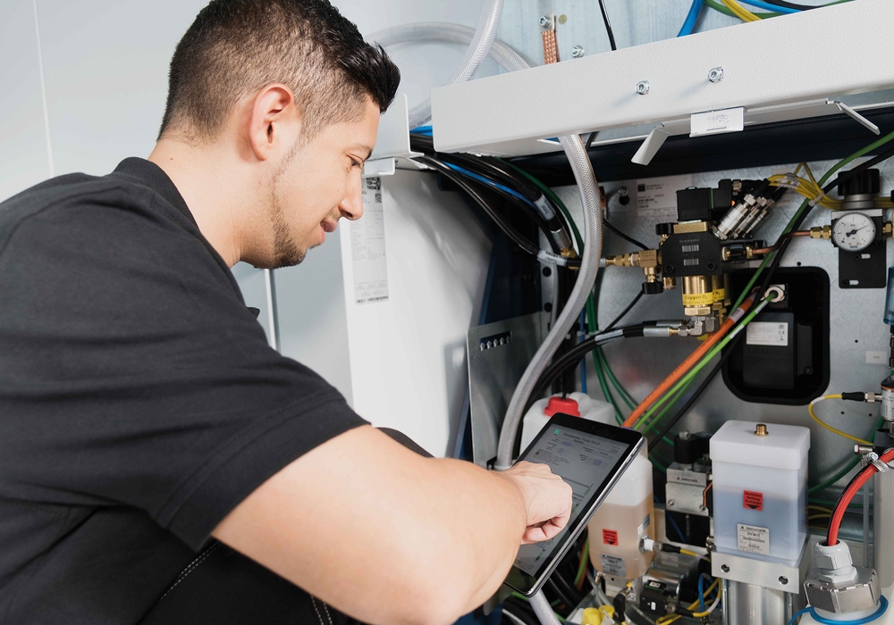 Service Engineer checking on machine