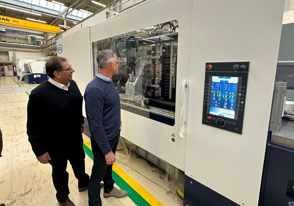 NETSTAL and Headland in front of machines