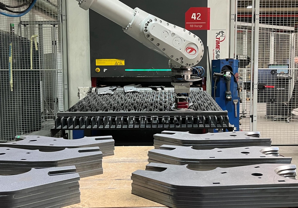 Timesavers sheet metal debarring and grinding robot are loading