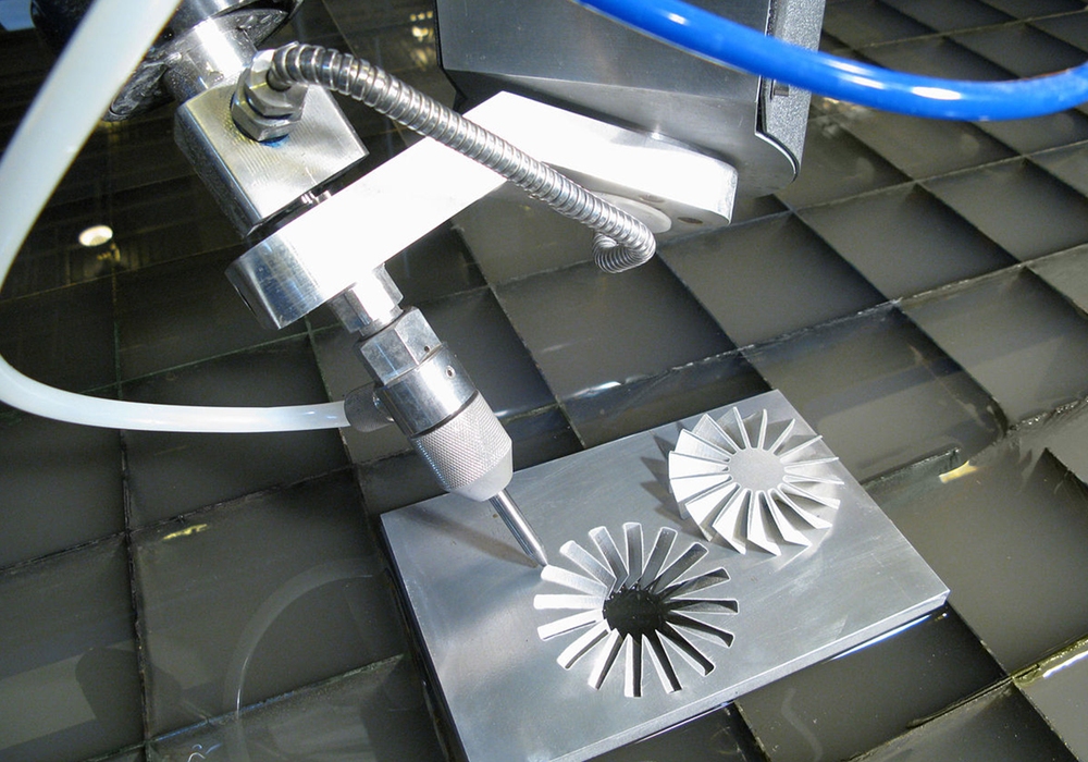 OMAX Metal fabrication water jet cutting for aerospace industry components