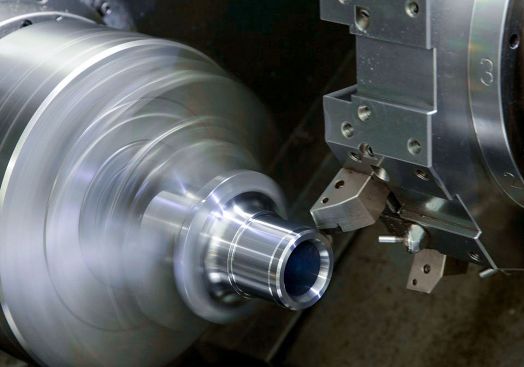 CNC Lathes: Fixed head vs sliding head - Headland